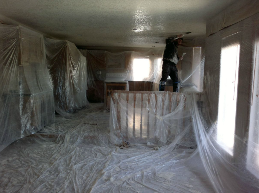 Interior protected with sheeting during ceiling work