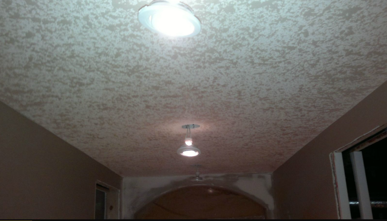 Completed textured ceiling in a residential interior